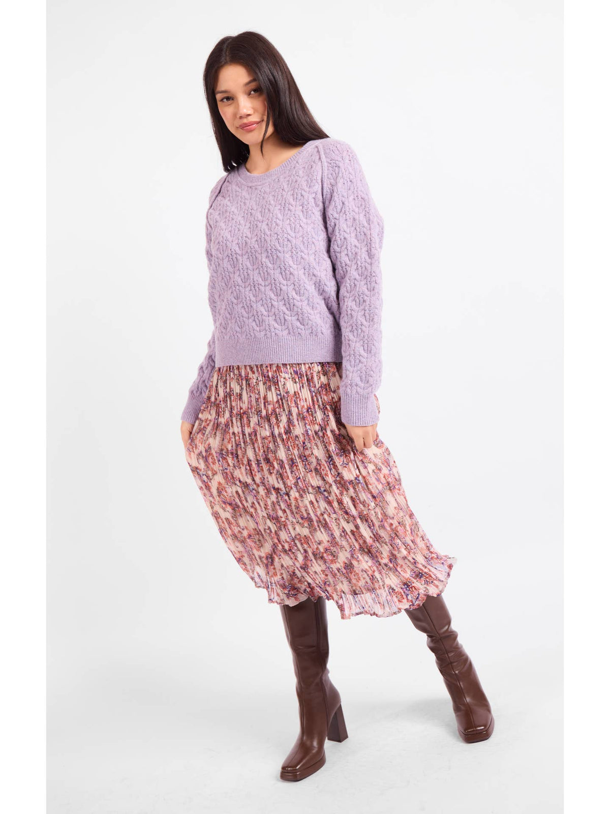 Lavender cable-knit sweater with crew neck and ribbed hem, long sleeves