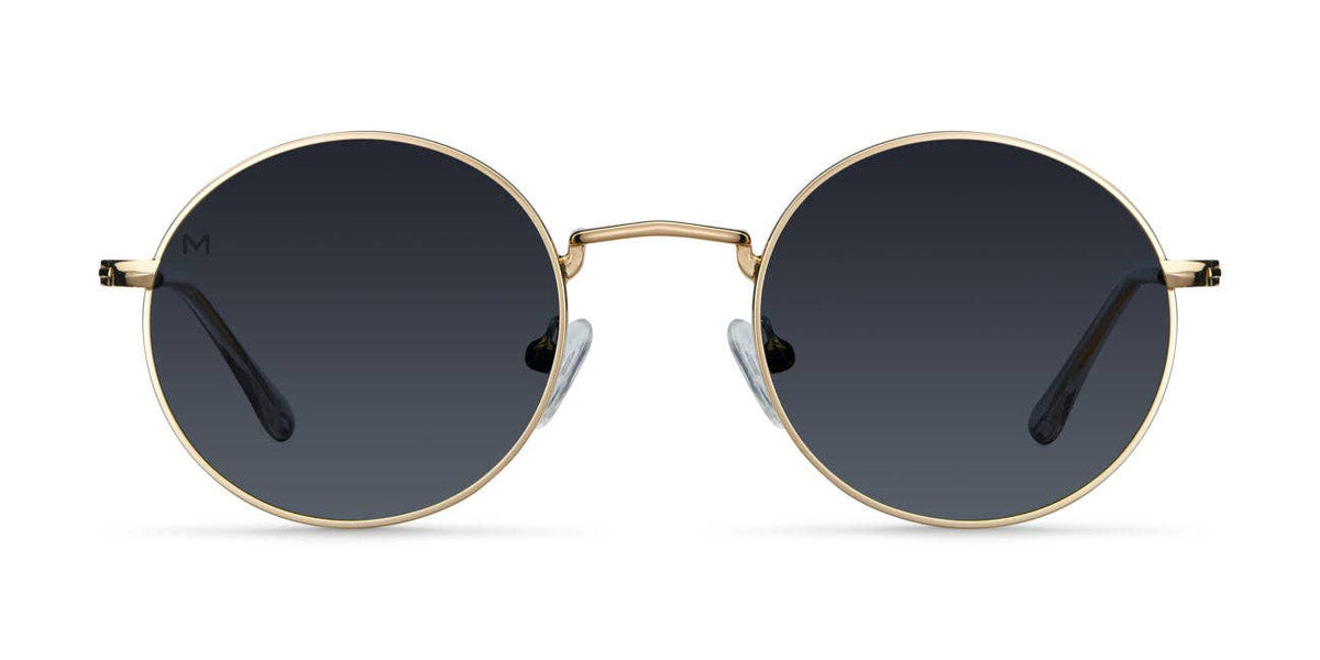 Round gold-tone sunglasses with dark lenses and thin metal frame, straight temples
