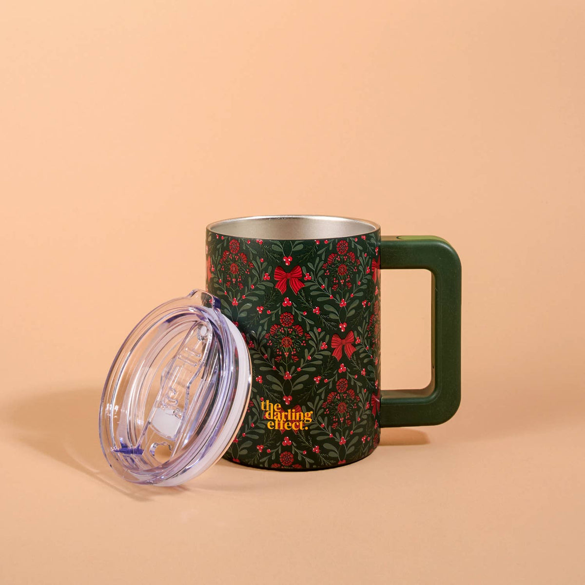 14 oz insulated mug with green floral print and clear flip-top lid, side handle
