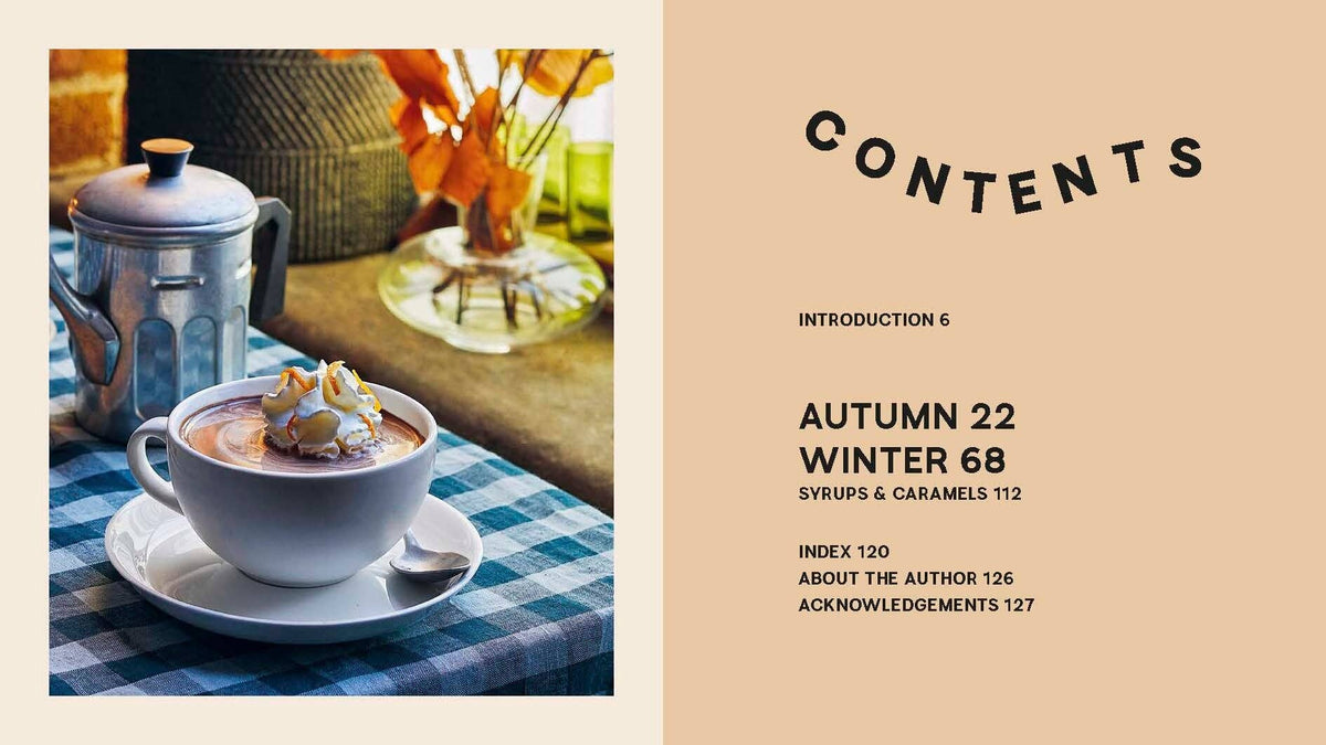 Cookbook spread with teapot and hot drink cup on a checkered table