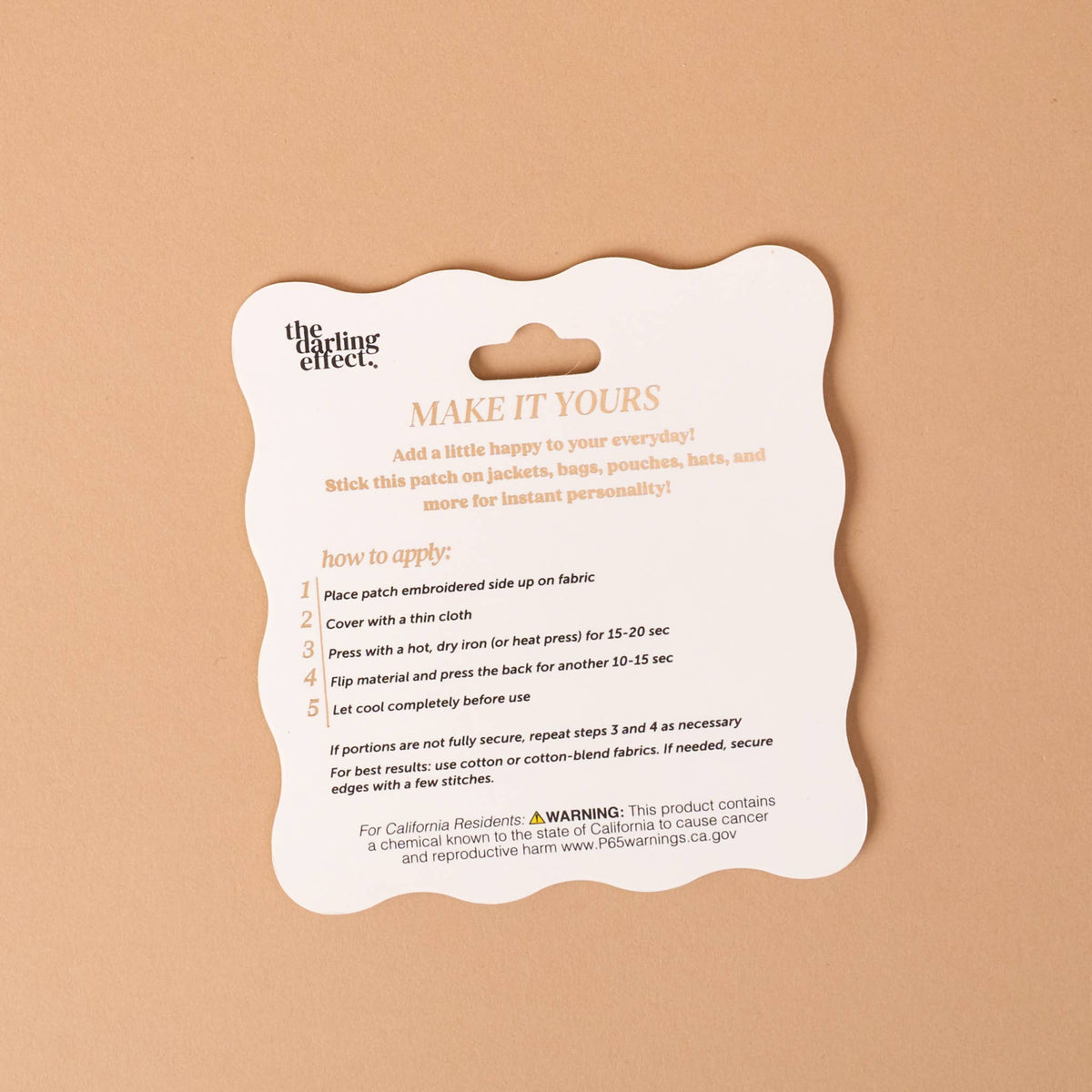 Iron-on patch packaging card with step-by-step application instructions