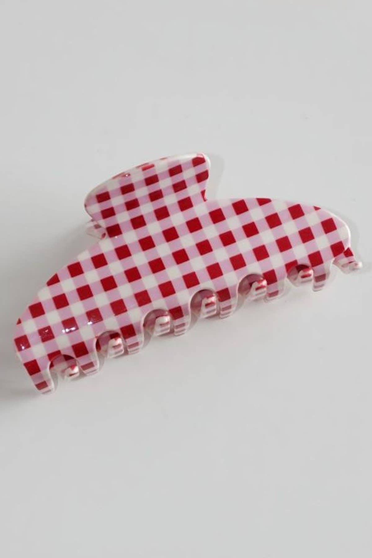 Jumbo oval plaid hair claw clip, red-and-white check pattern