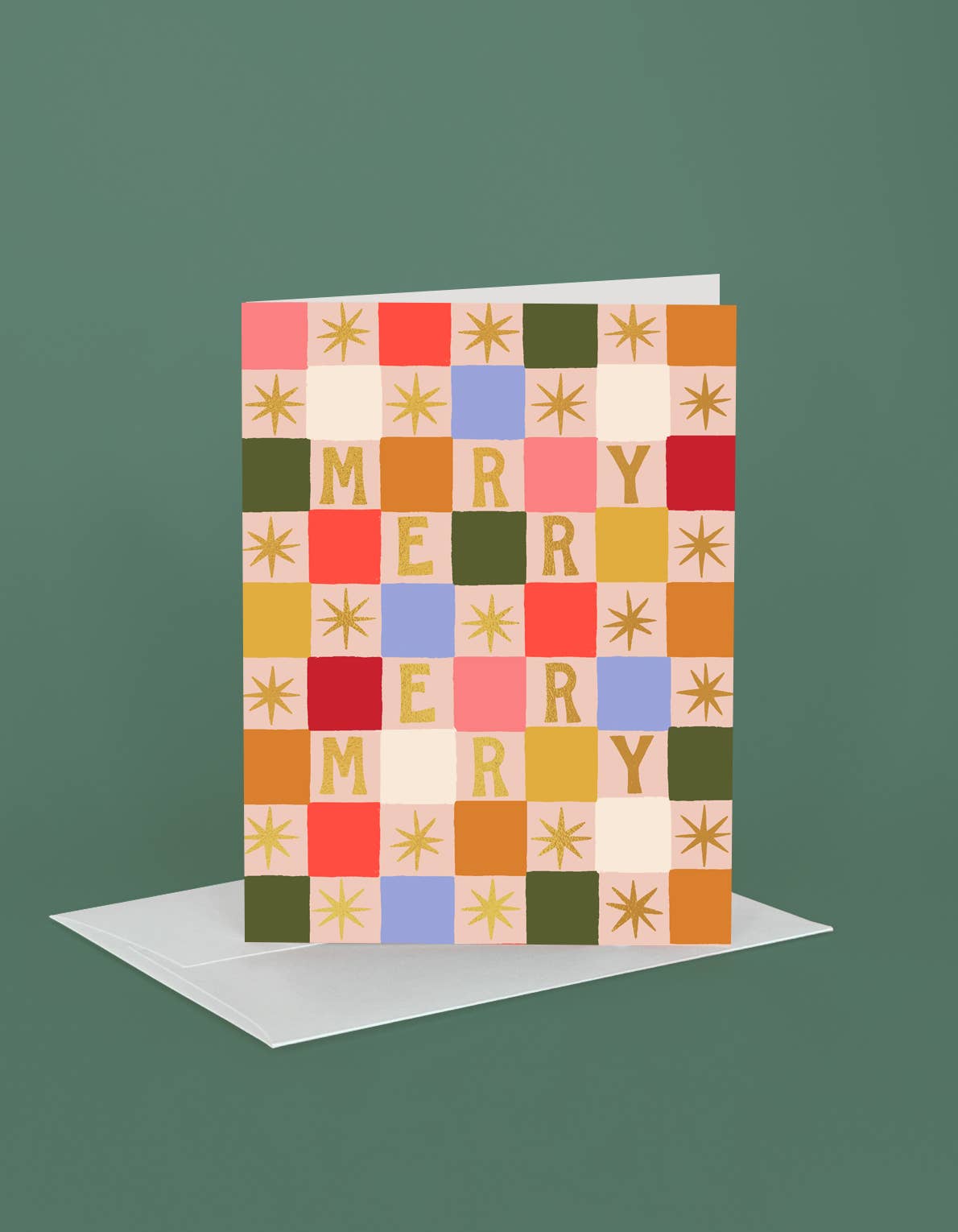 Holiday greeting card with checkered blocks, star accents, and MERRY letter pattern