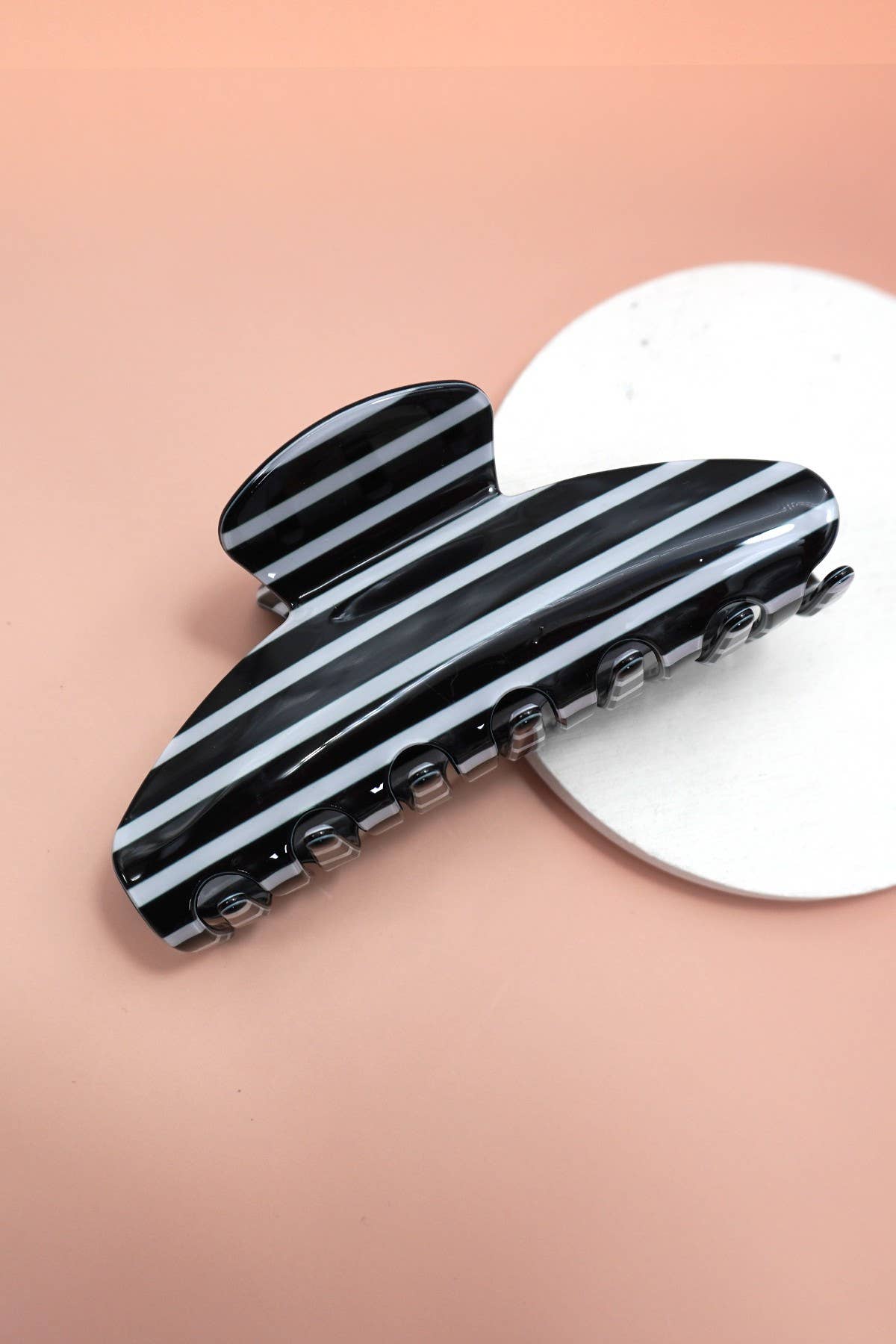 Jumbo oval striped hair claw clip, black-and-white horizontal stripes