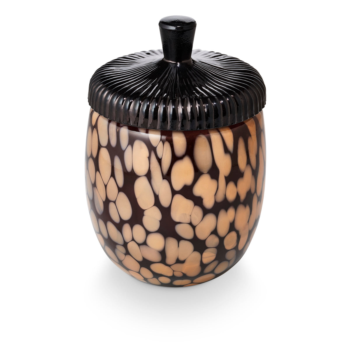 Amber patterned glass candle jar with black ribbed acorn-style lid