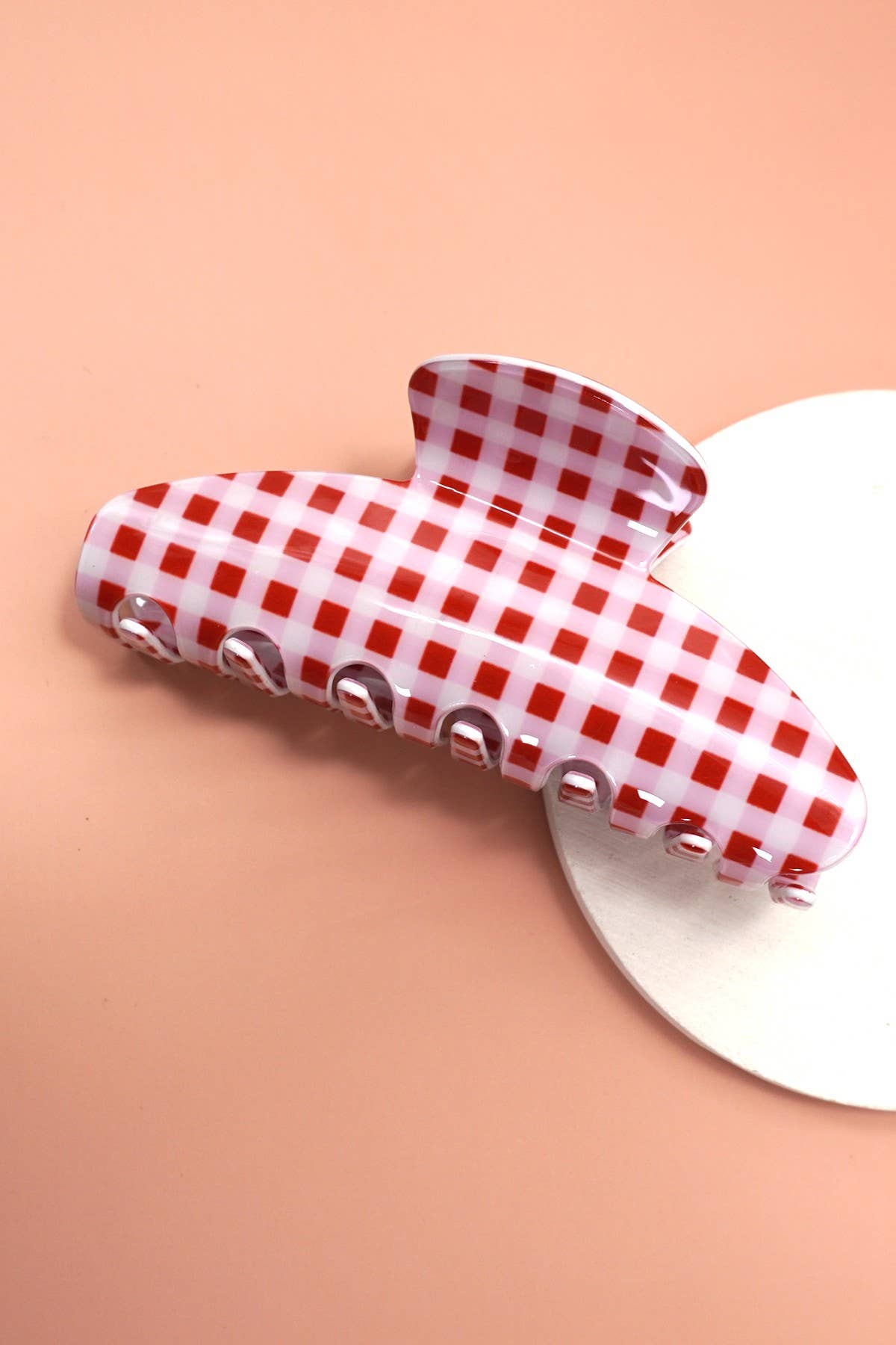 Jumbo oval plaid hair claw clip, red-and-white gingham pattern