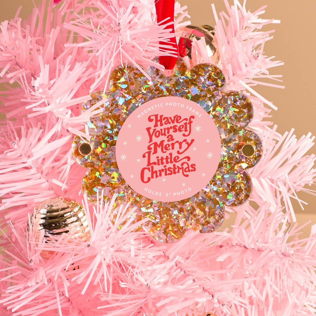 Gold glitter scalloped ornament with red ribbon and round holiday quote card