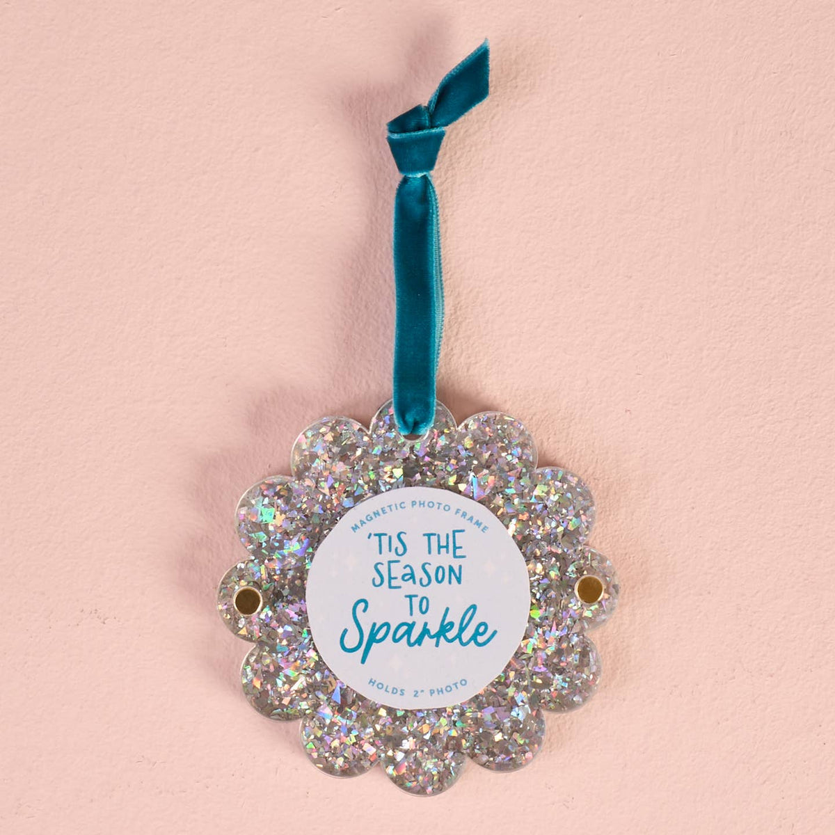 Silver glitter scalloped photo frame ornament with blue hanging ribbon and round center card
