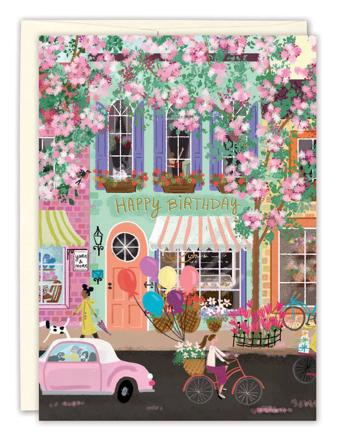 Birthday card with street scene, pink blossoms, and “Happy Birthday” text