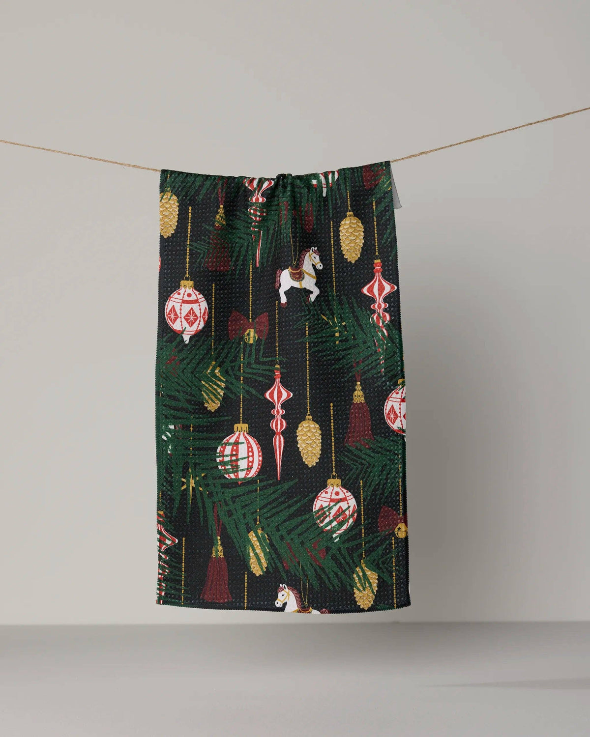 Keepsake ornaments mini towel with dark green hanging loop and colorful ornament pattern