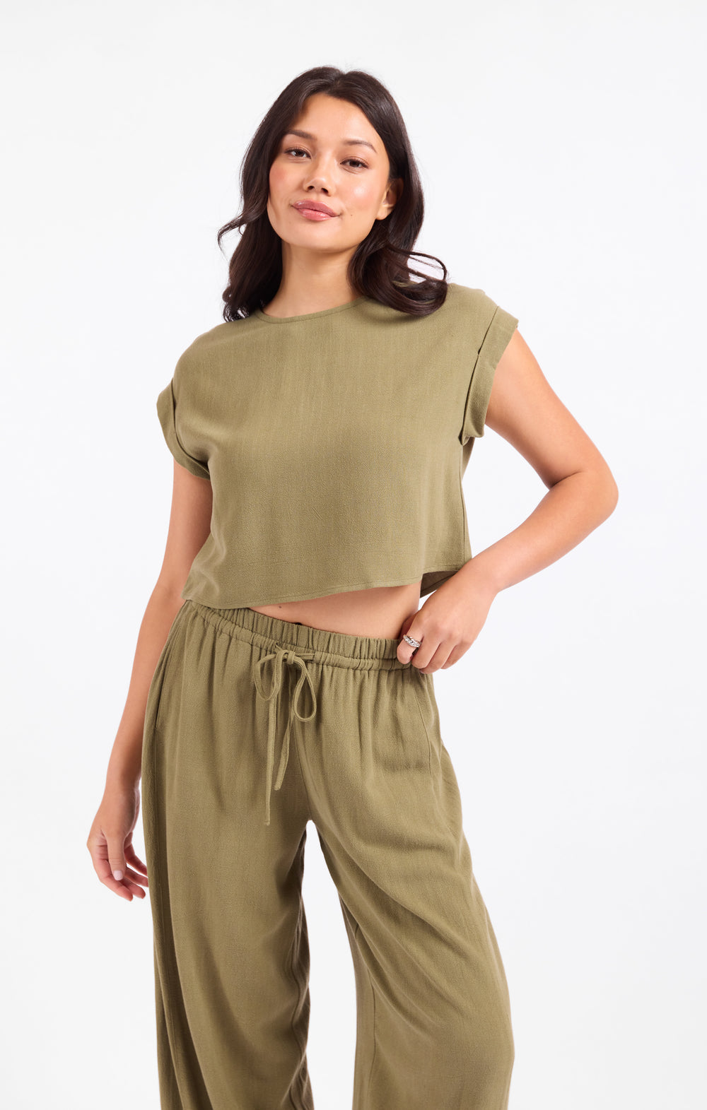 Olive green short-sleeve cuffed top with crew neck, cropped hem
