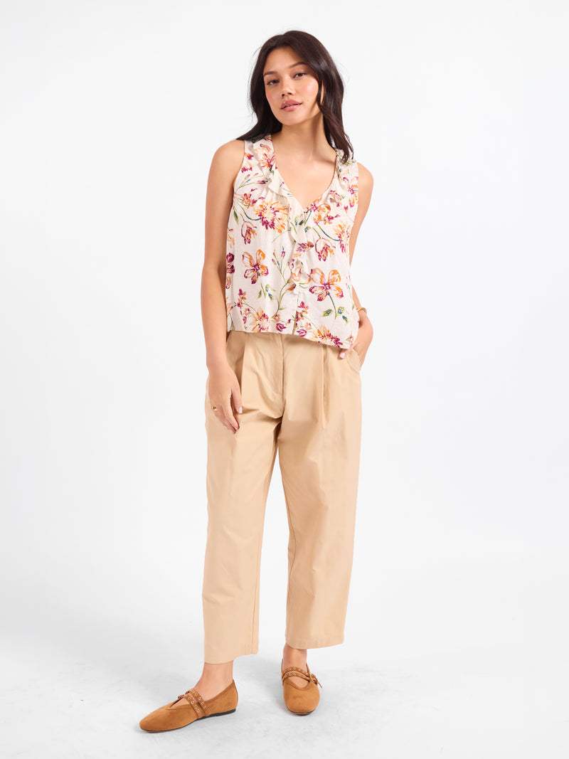 Floral sleeveless V-neck blouse with button front and ruffled neckline trim