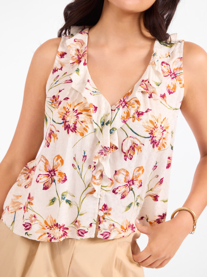 Close-up floral sleeveless V-neck top with button front and ruffle details