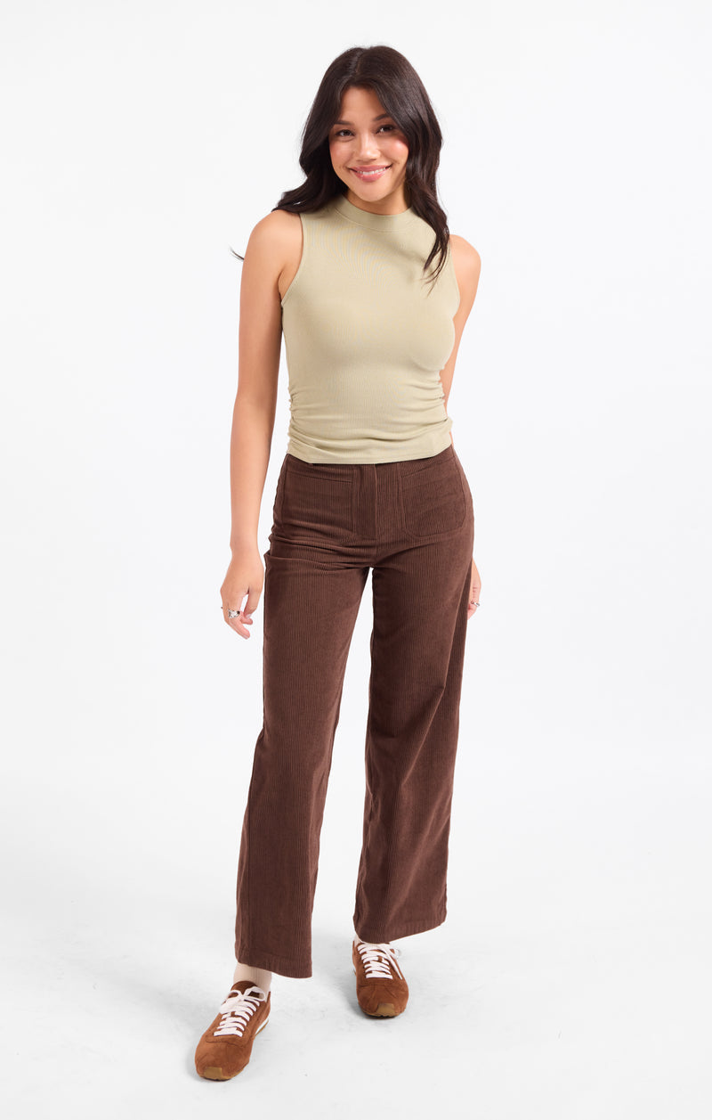 Cream mock neck sleeveless knit tank with ruched waist detail