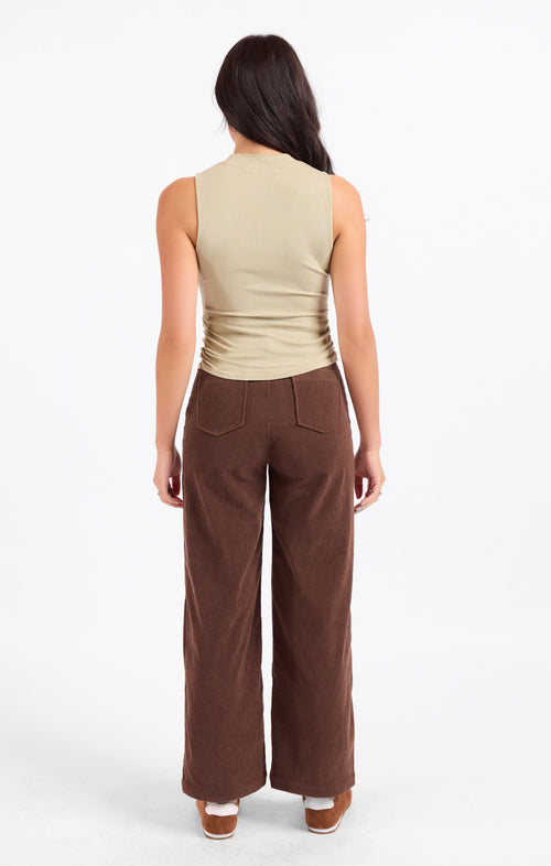 Cream mock neck sleeveless ruched knit tank, back view