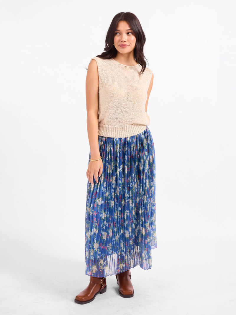 Oatmeal sleeveless knit sweater vest with crew neck and ribbed hem detail.
