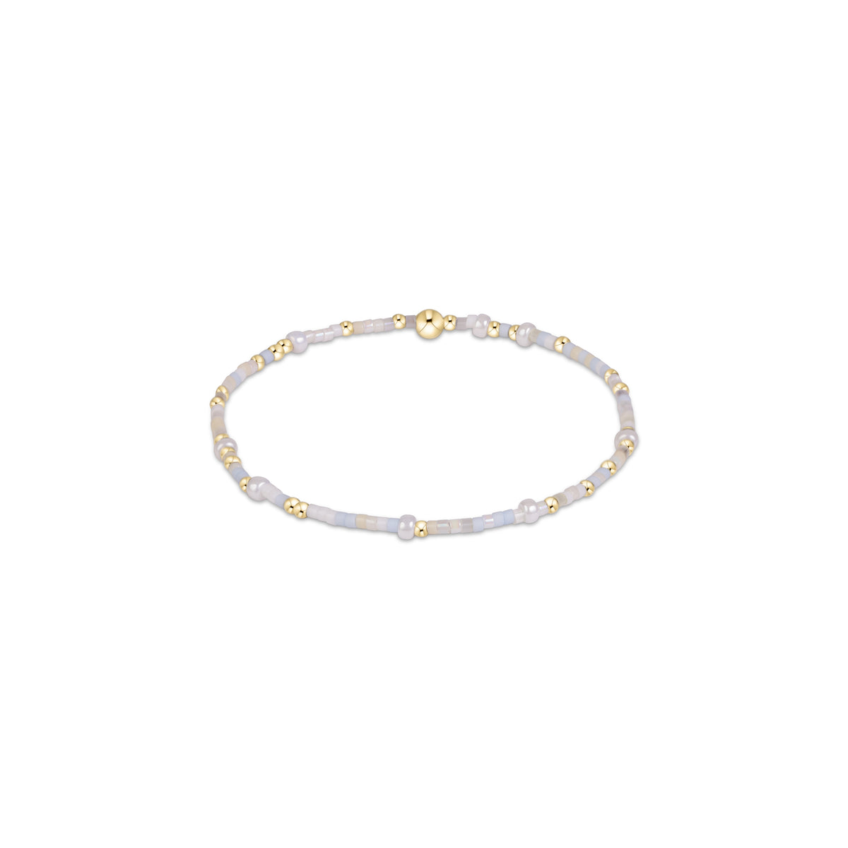 Light blue beaded bracelet with small gold spacers and center charm