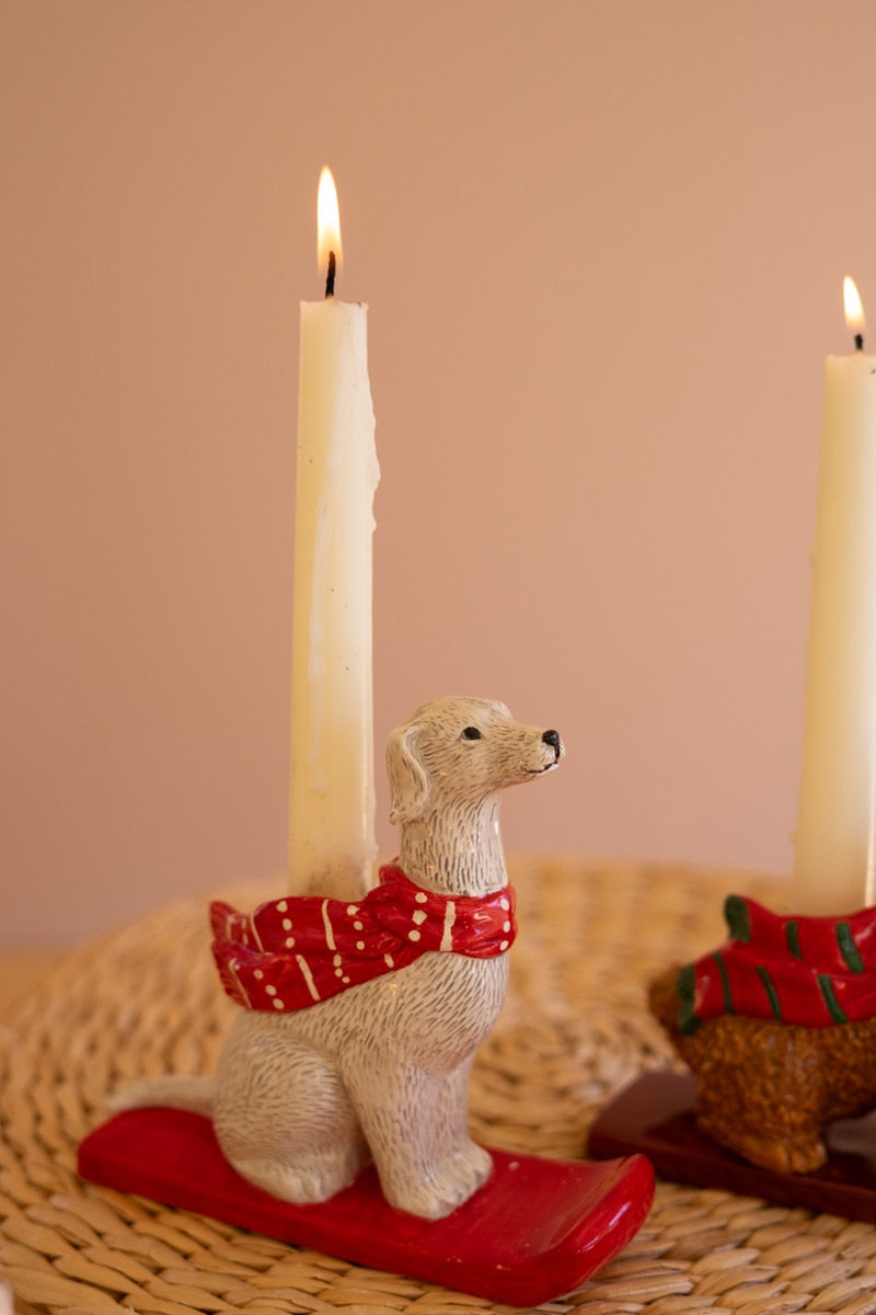 Ceramic dog taper candle holder with red scarf, light dog on red base