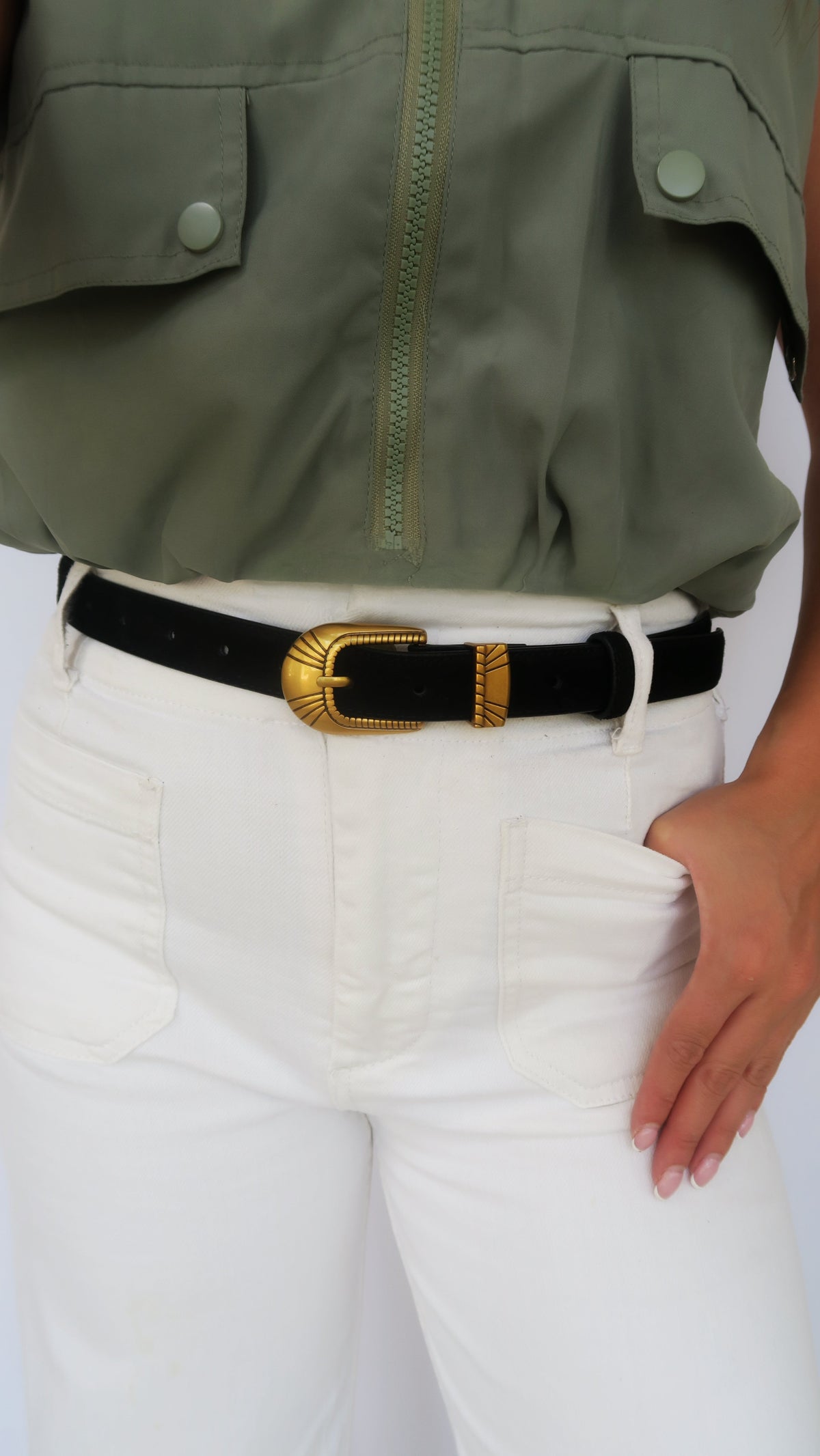 Sawyer Belt in dark color with gold-tone oval buckle and decorative plate