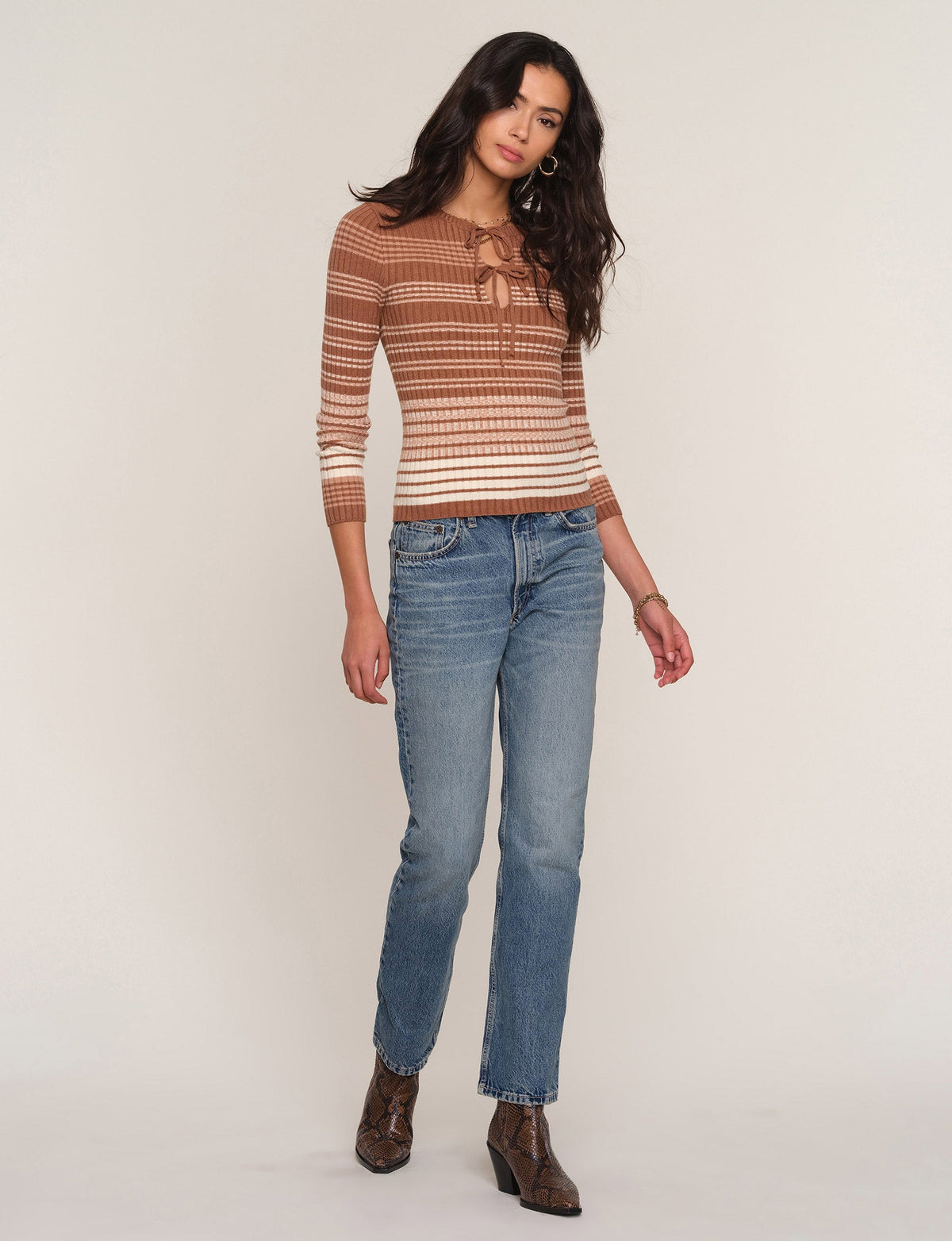 Striped knit long-sleeve top, rust brown and cream; hip-length pullover
