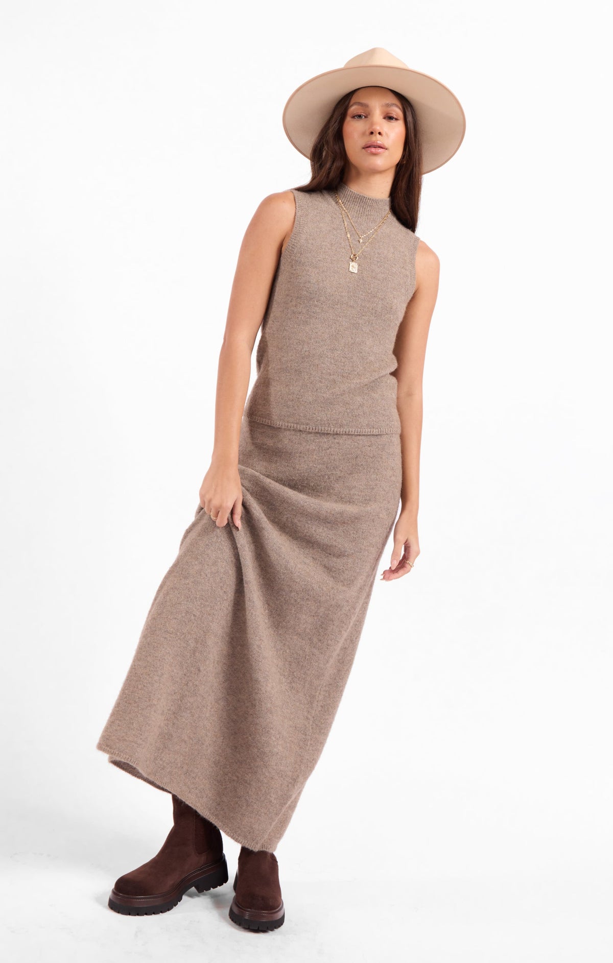 Heather beige knit sleeveless sweater tank with crew neck and long hem