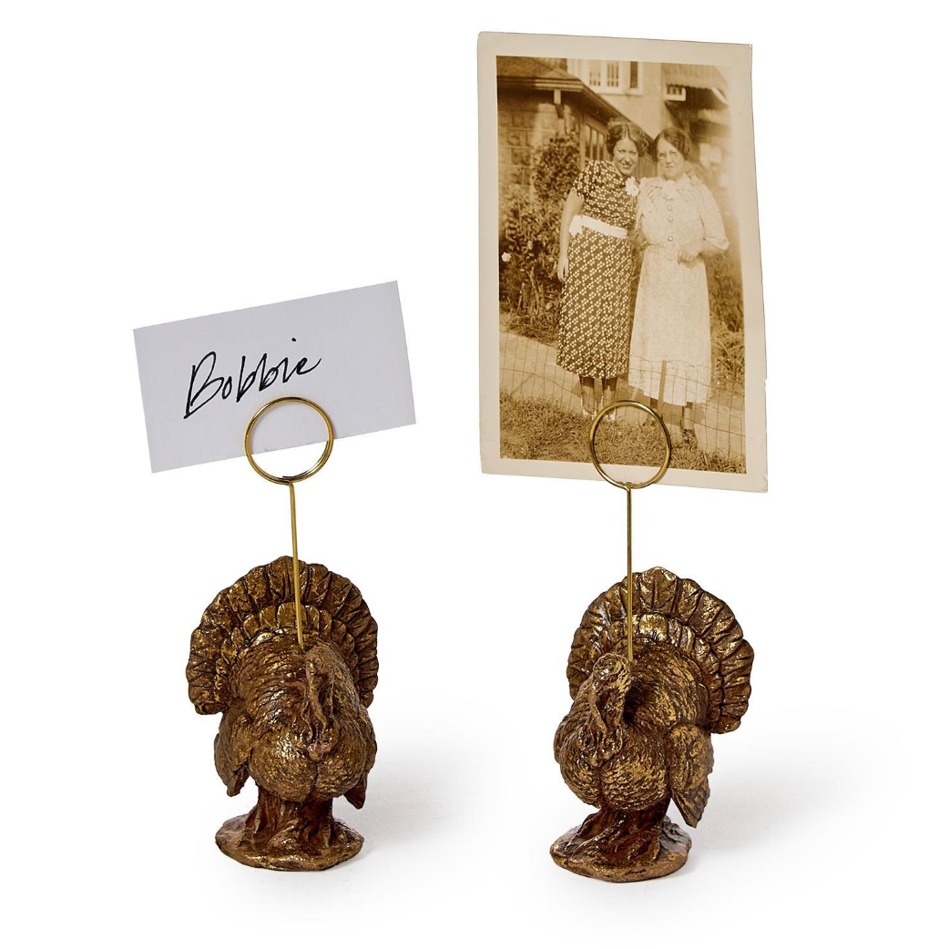 Set of two golden turkey place card holders with circular ring and name cards