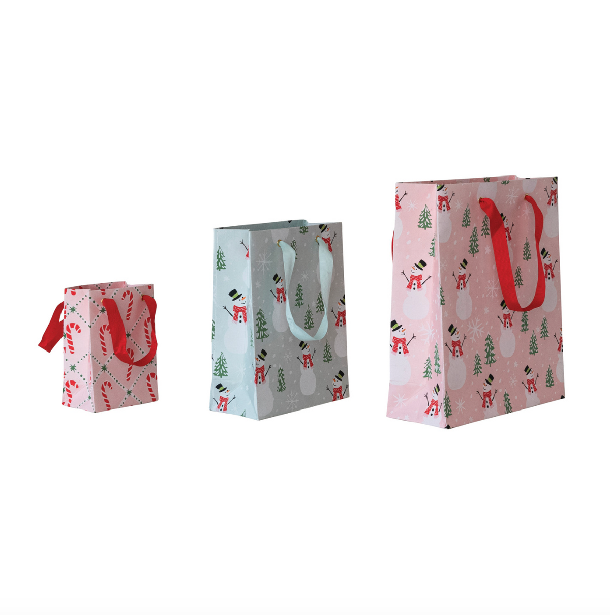 Holiday gift bag set with three patterned paper bags in pink, blue, and red, with handles