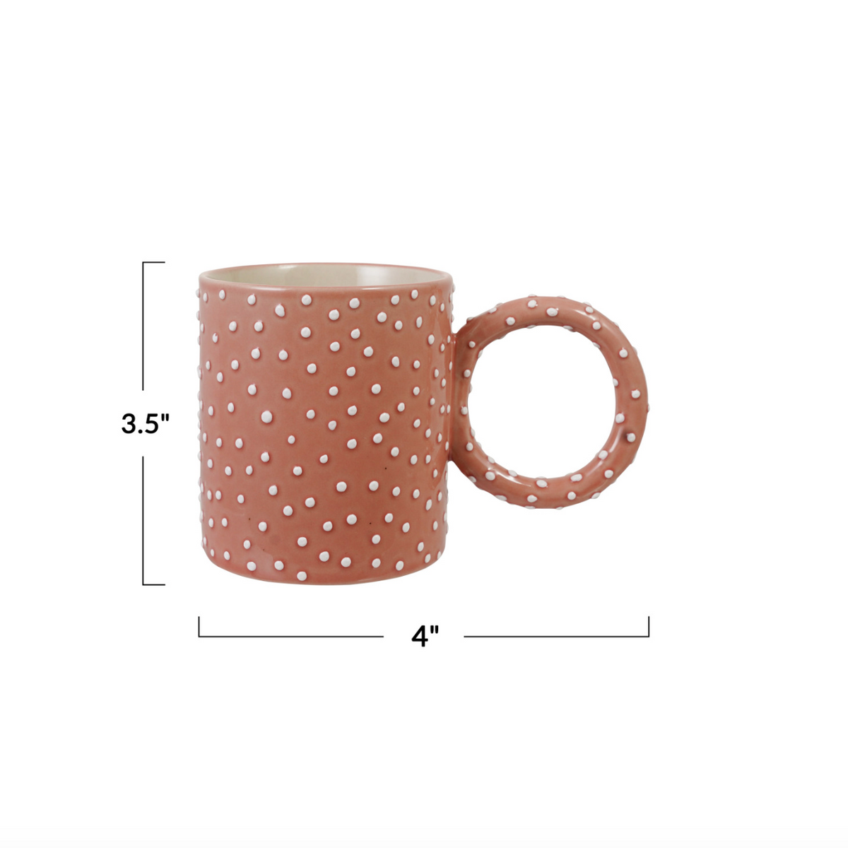 Pink polka dotted mug, 4 in wide and 3.5 in tall, with loop handle