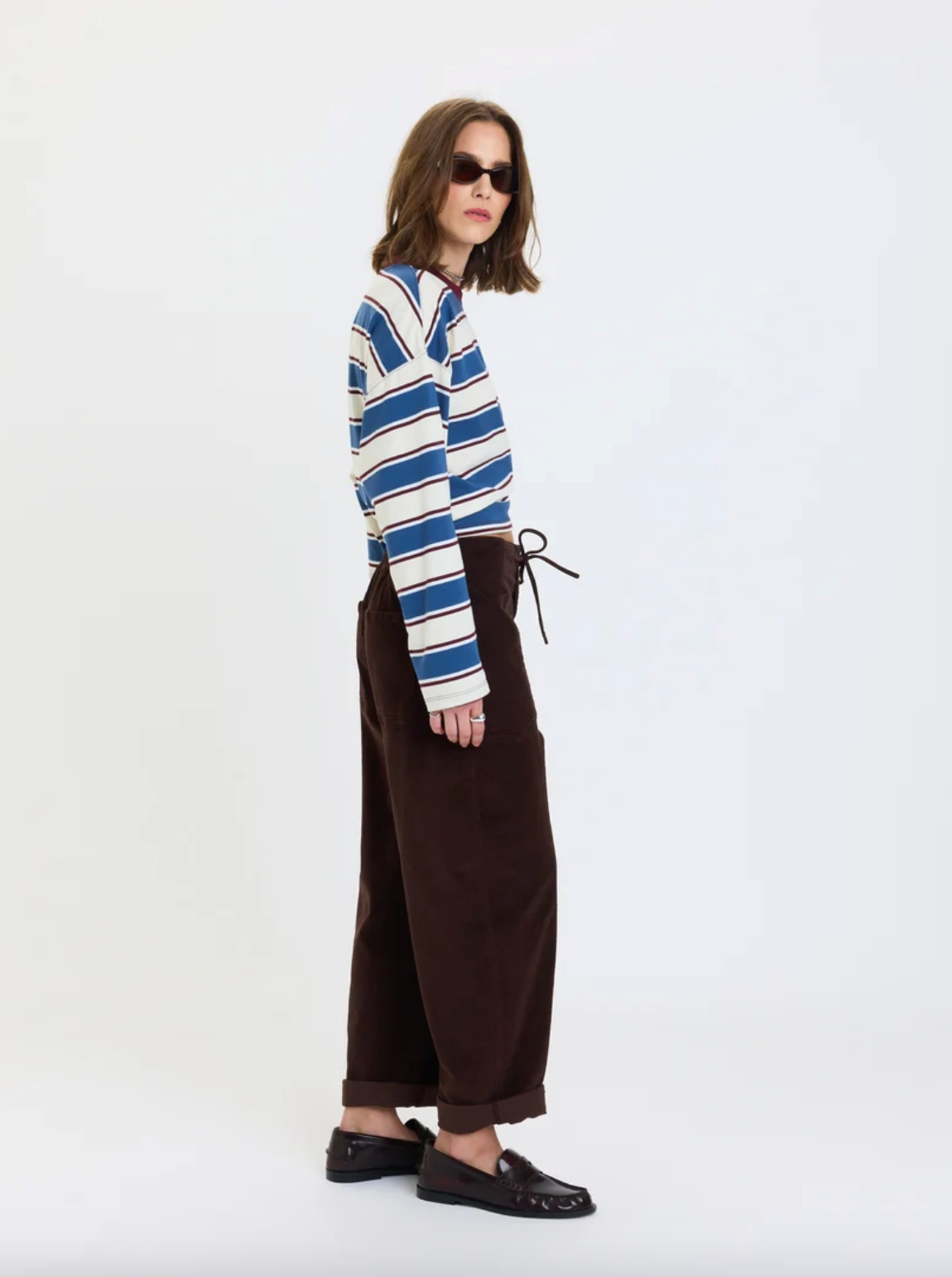 Dark brown barrel pants with drawstring waist and relaxed, loose fit