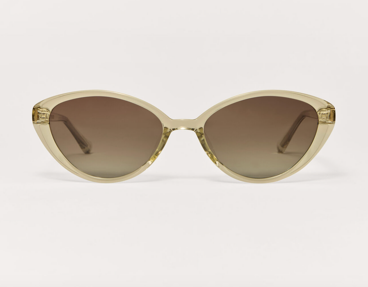 Nouveau polarized sunglasses with light olive frames and brown gradient lenses