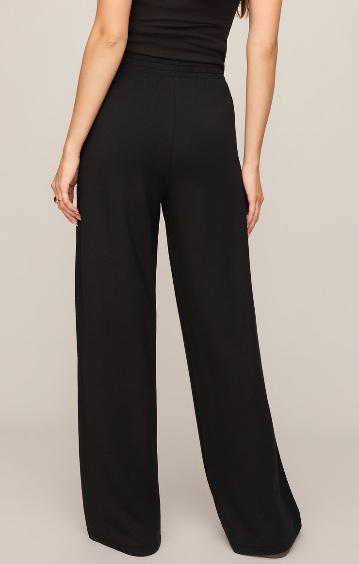 Black wide-leg modal pants with straight front and relaxed, full-length leg.