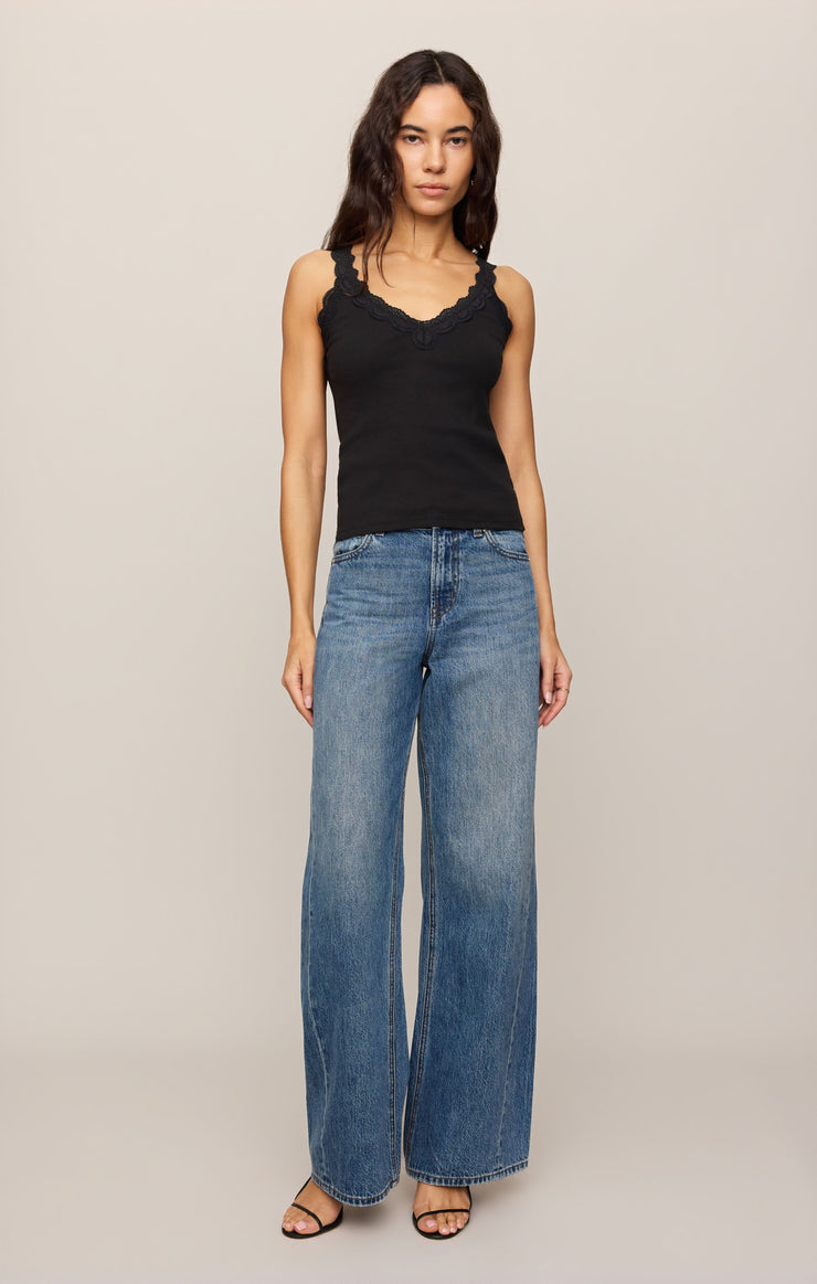 Black lace-trim tank with scalloped V neckline and thin shoulder straps