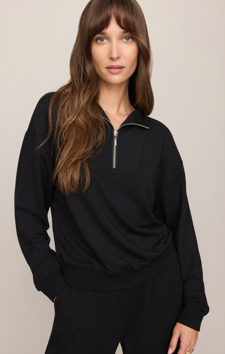 Black half-zip sweatshirt with zip collar, kangaroo pocket, ribbed cuffs and hem
