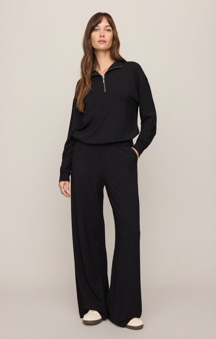 Black half-zip sweatshirt with long sleeves and ribbed cuffs, relaxed silhouette