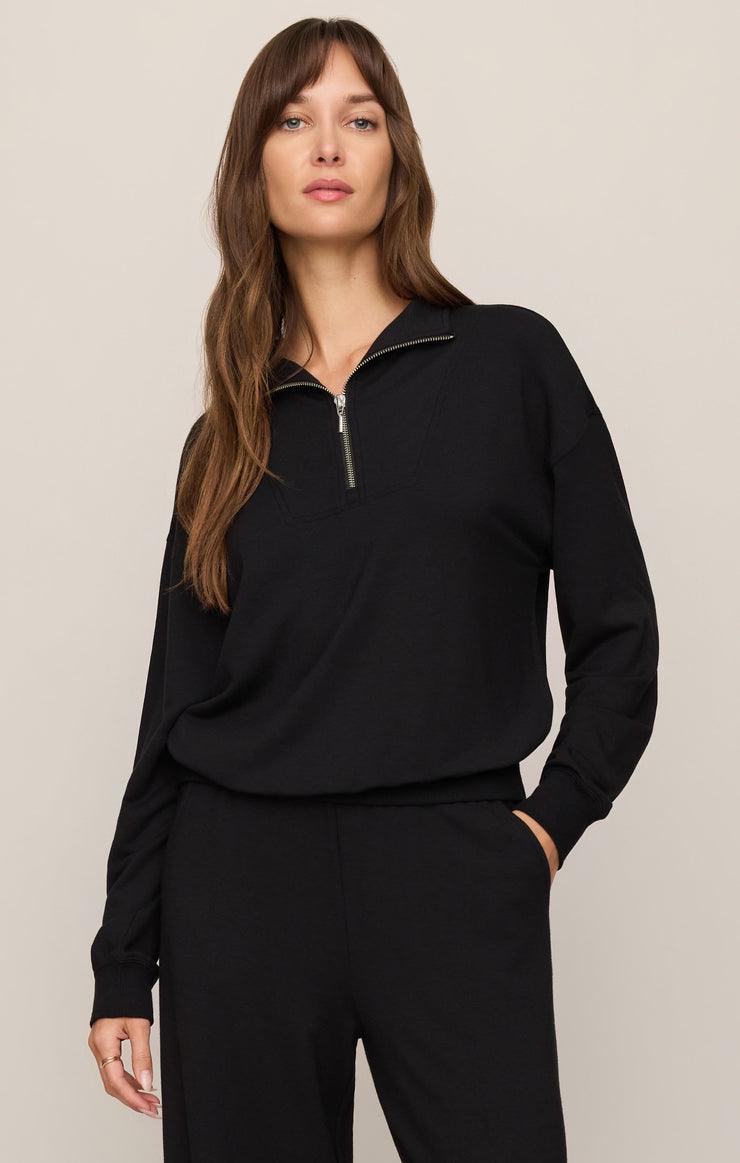 Black half-zip sweatshirt with ribbed cuffs and hem, front zipper placket, kangaroo pocket