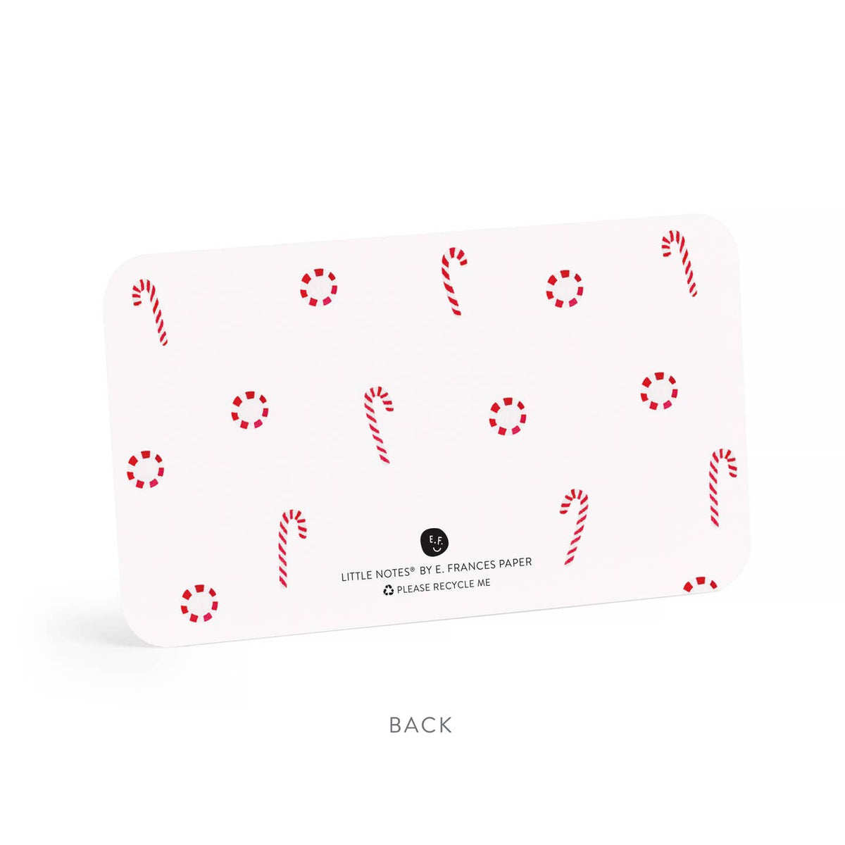 White note cards patterned with red candy canes and peppermint circles, back side