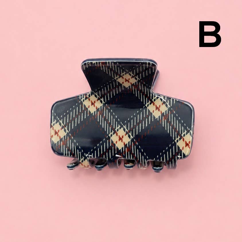 Navy plaid hair claw clip with five prongs and clear holder
