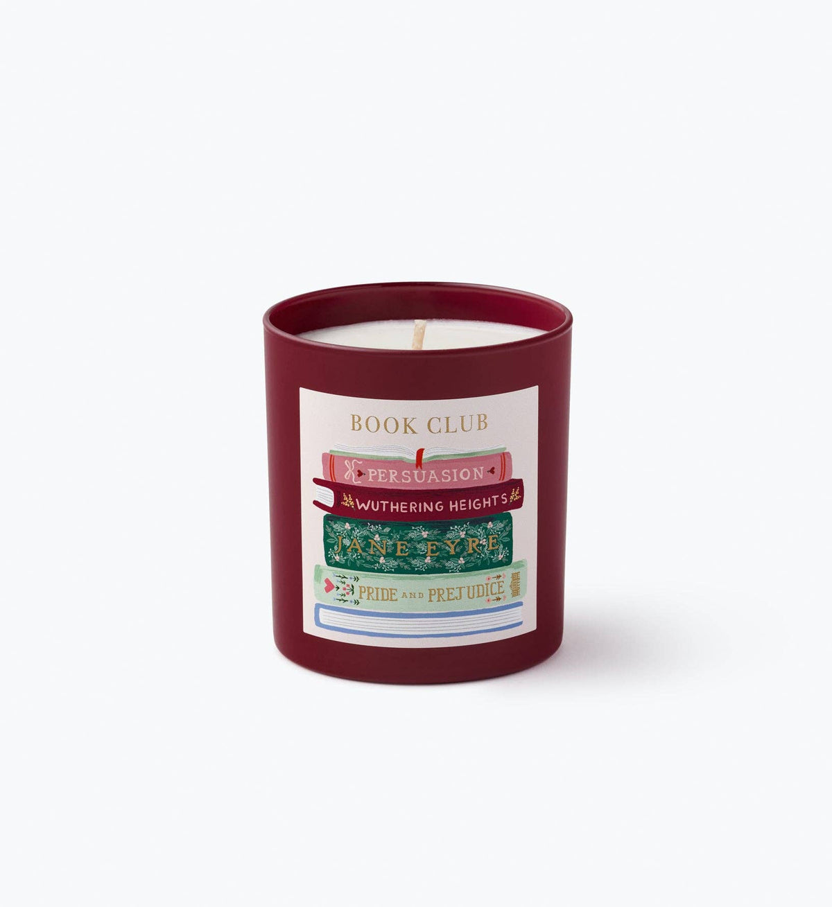 Burgundy glass candle with Book Club label and lit wick
