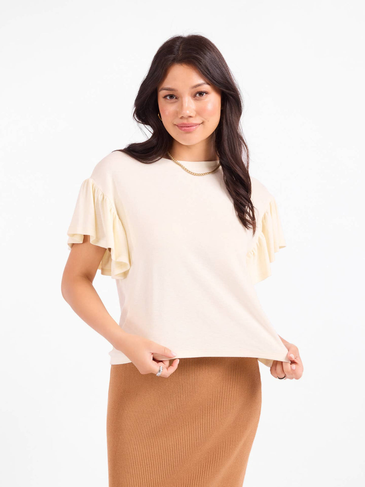 Light cream ruffle sleeve top with round neckline and relaxed fit