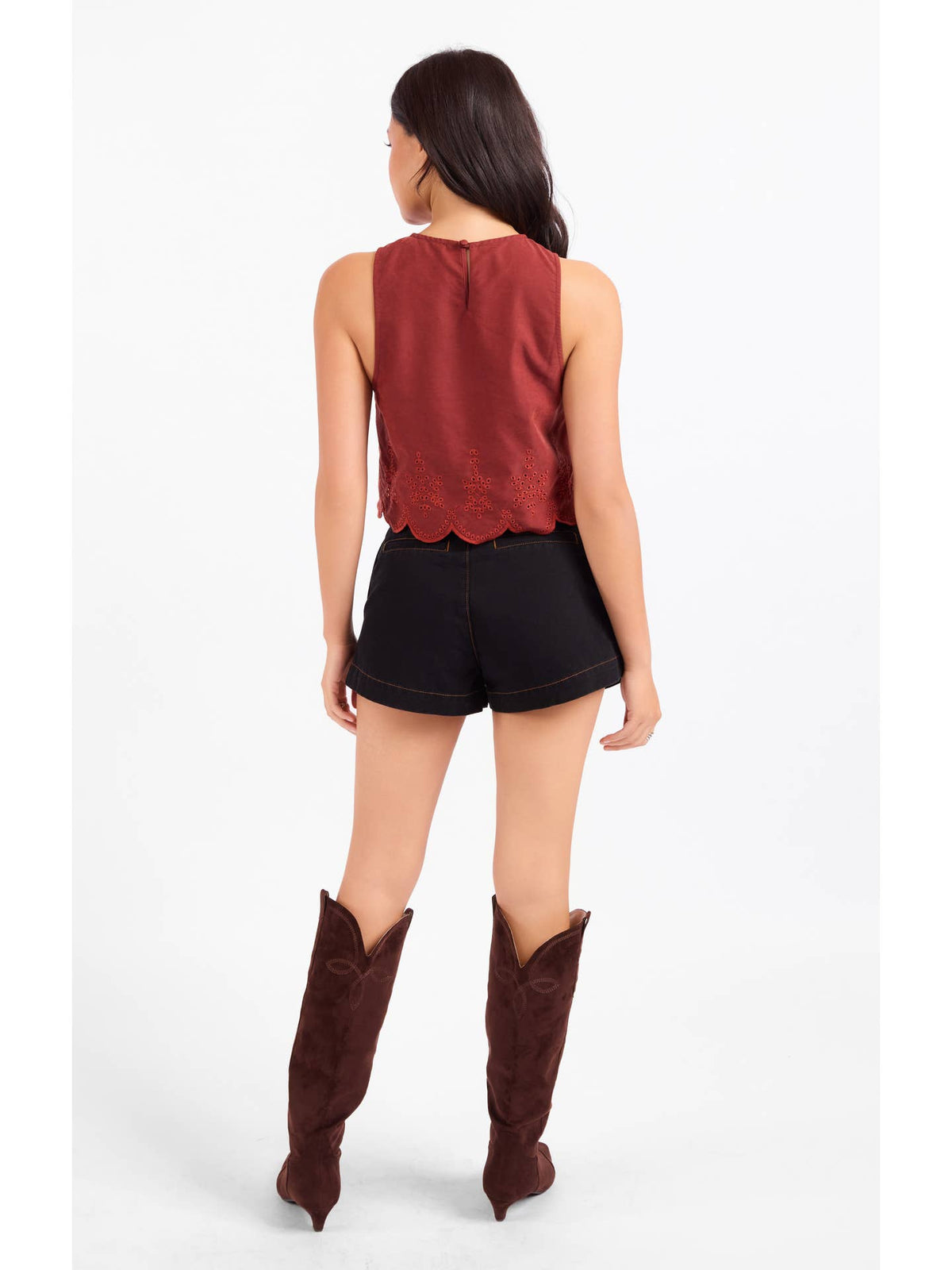 Rust sleeveless scallop-hem top with eyelet trim on hem and back keyhole