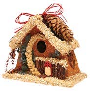 Small decorative birdhouse ornament with pinecone roof and red-trim candles