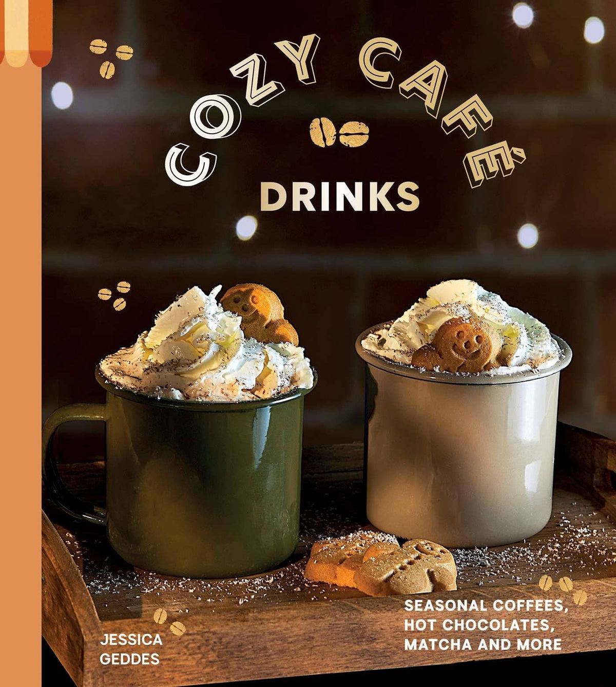 Hot chocolate and latte mugs with whipped topping on a wooden table