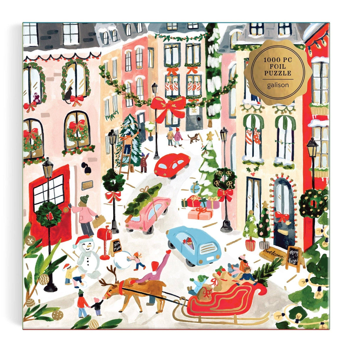 Foil jigsaw puzzle box front with winter village scene and ribbon decorations
