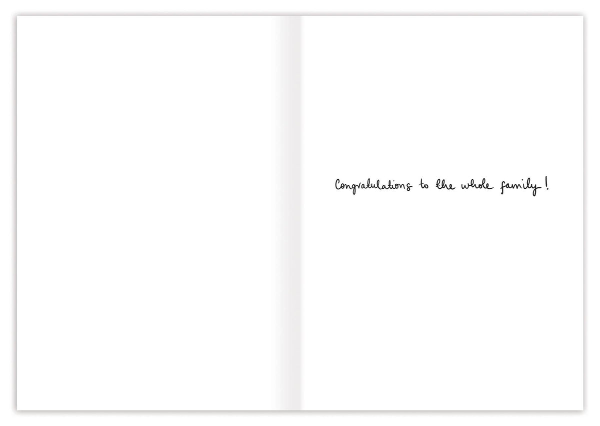 Open baby card with small printed welcome message on the inside