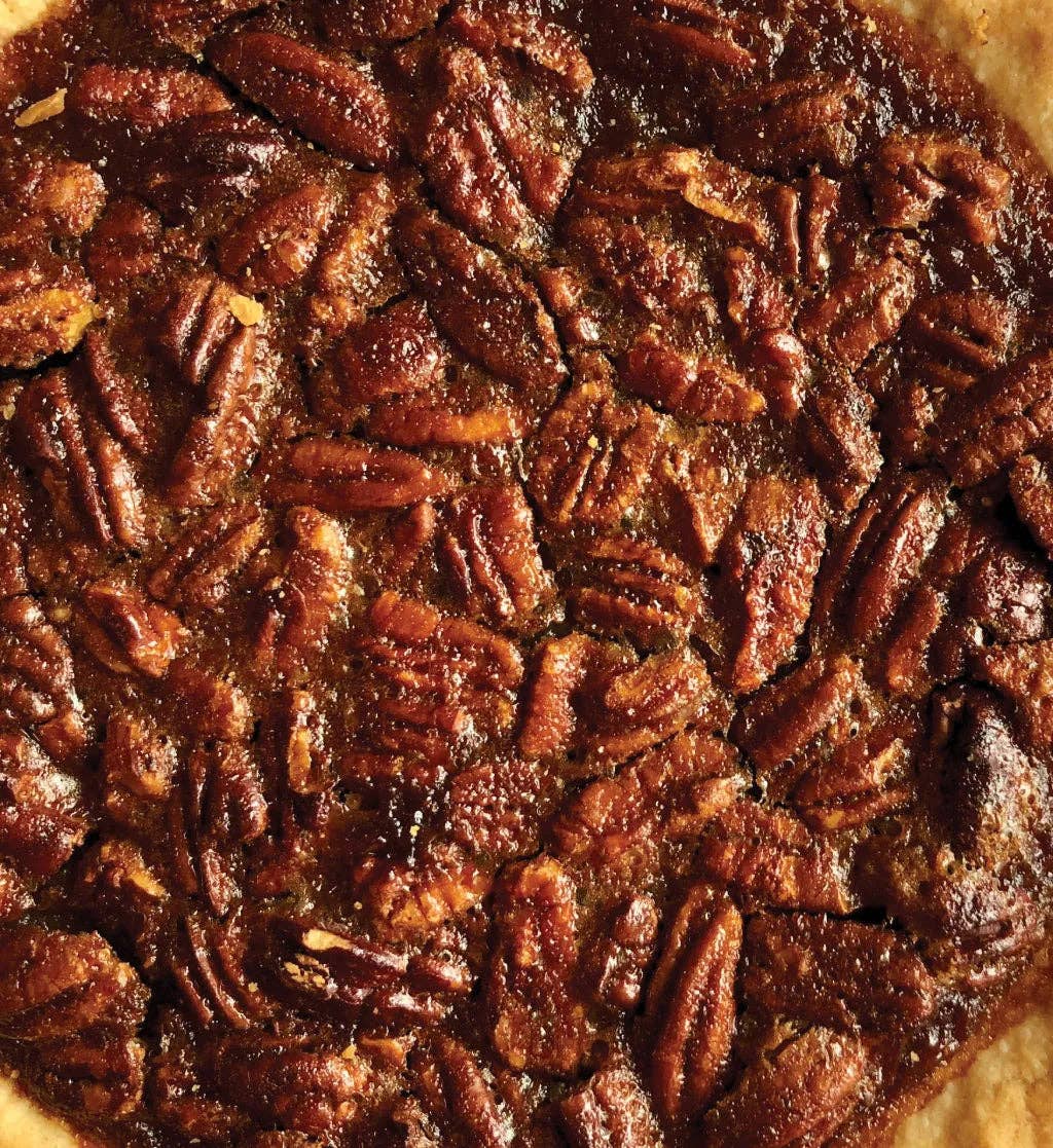 Dark brown pecan pie latte mixer pieces with chunky textured surface