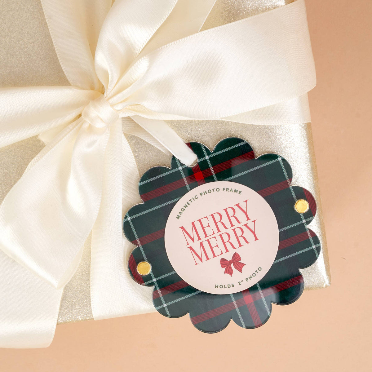 Evergreen plaid scalloped photo frame ornament with “MERRY MERRY” and a white bow