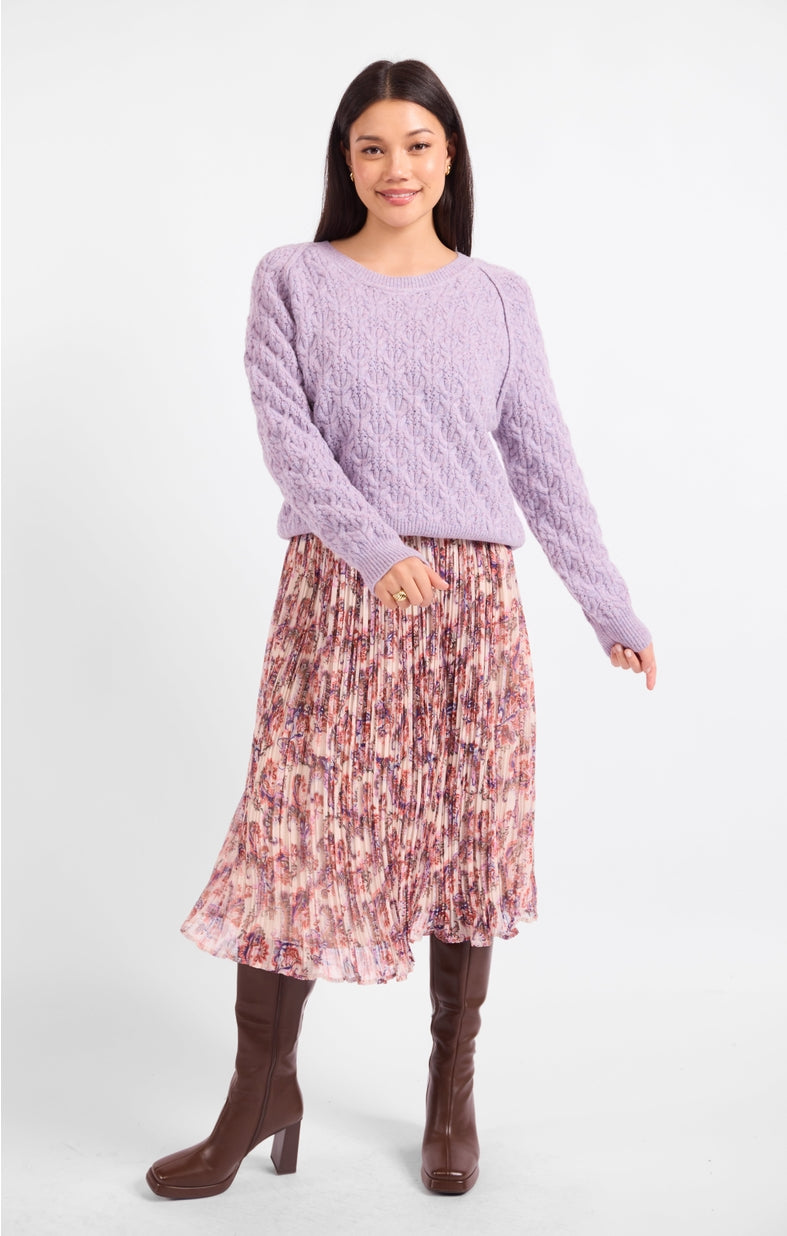 Lavender cable-knit sweater with round crew neck and long sleeves