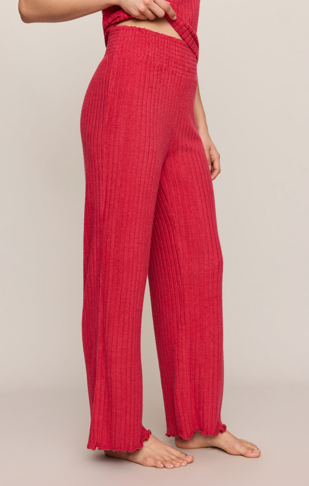 Ruby red smocked ribbed wide-leg pants with elastic waist, ankle length