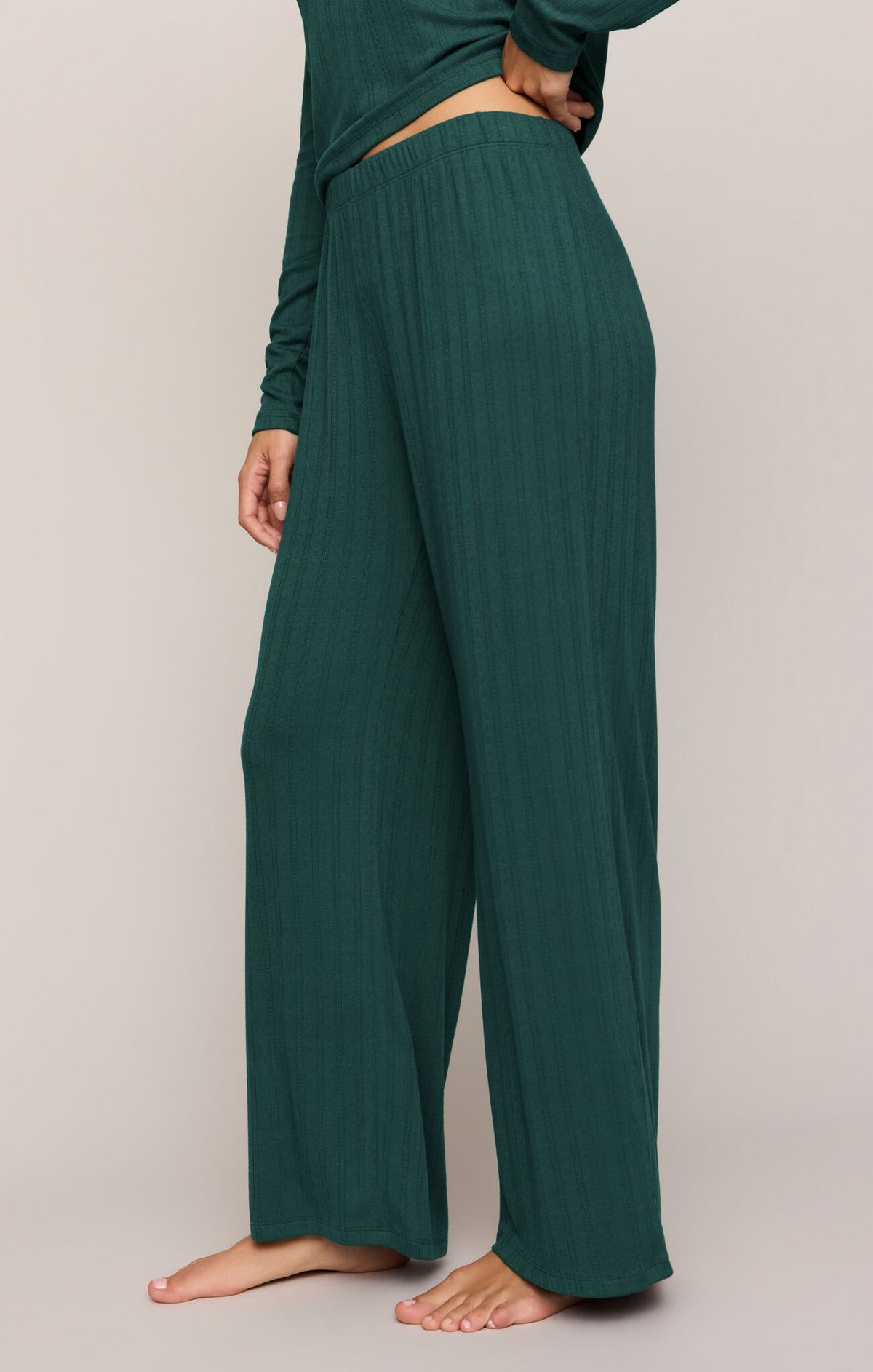 Green velvet knit pants with elastic waistband, wide straight legs, full length