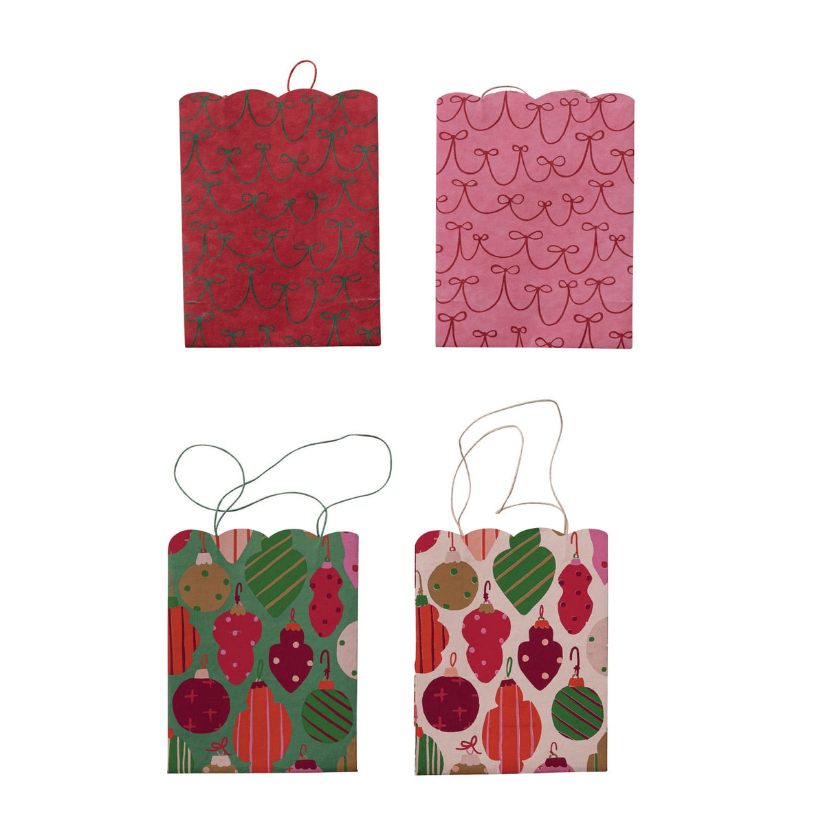 Scalloped holiday gift bags with bow handles: red, pink, and mixed fruit patterns.
